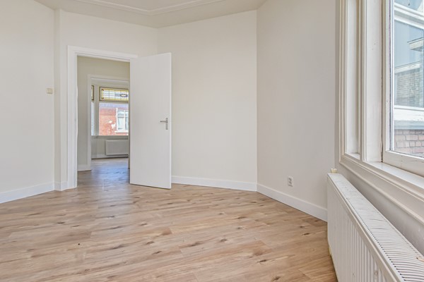 Medium property photo - Johan Gramstraat 48, 2522 XA Den Haag